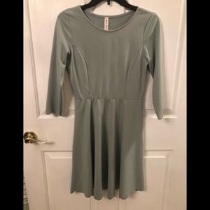 Scalloped sleeves and hem dress